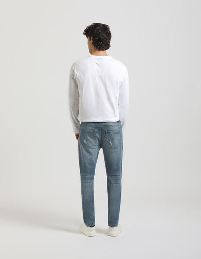 Jeans regular fit con strappi