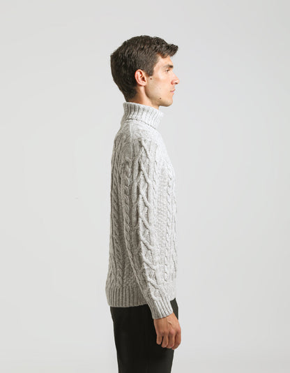 Maglia collo alto con treccia