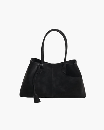Large dark brown vegan suede handbag for women with double handles and retro design on white background.